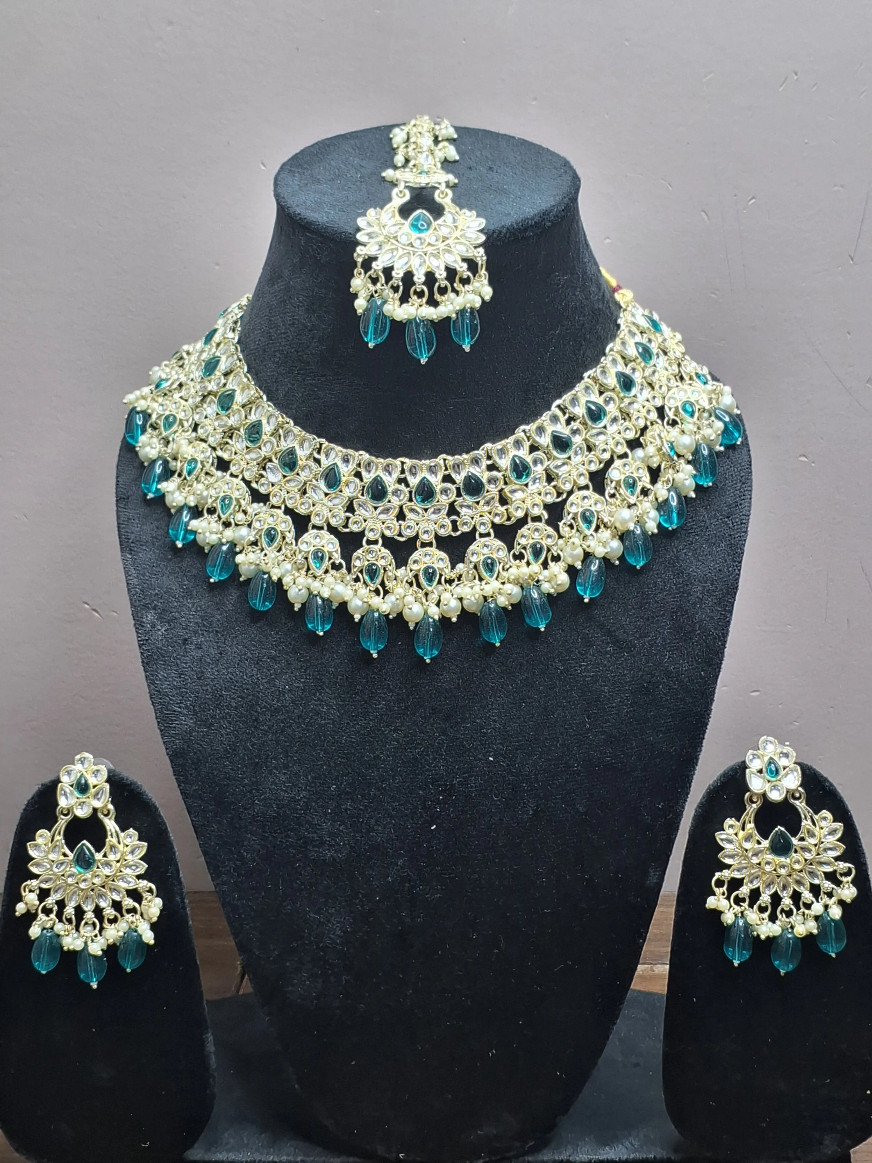 Green colour Silver Plated Kundan Necklace with Earring & Maang Tikka