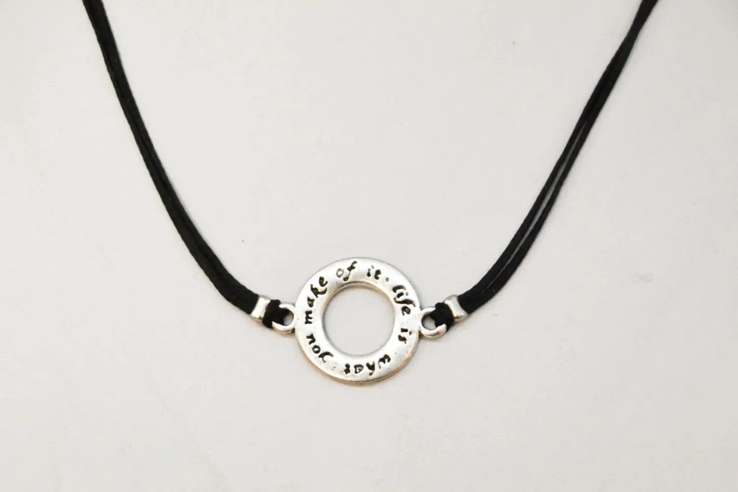 Life is what you make of it necklace for men, silver karma circle, black cord