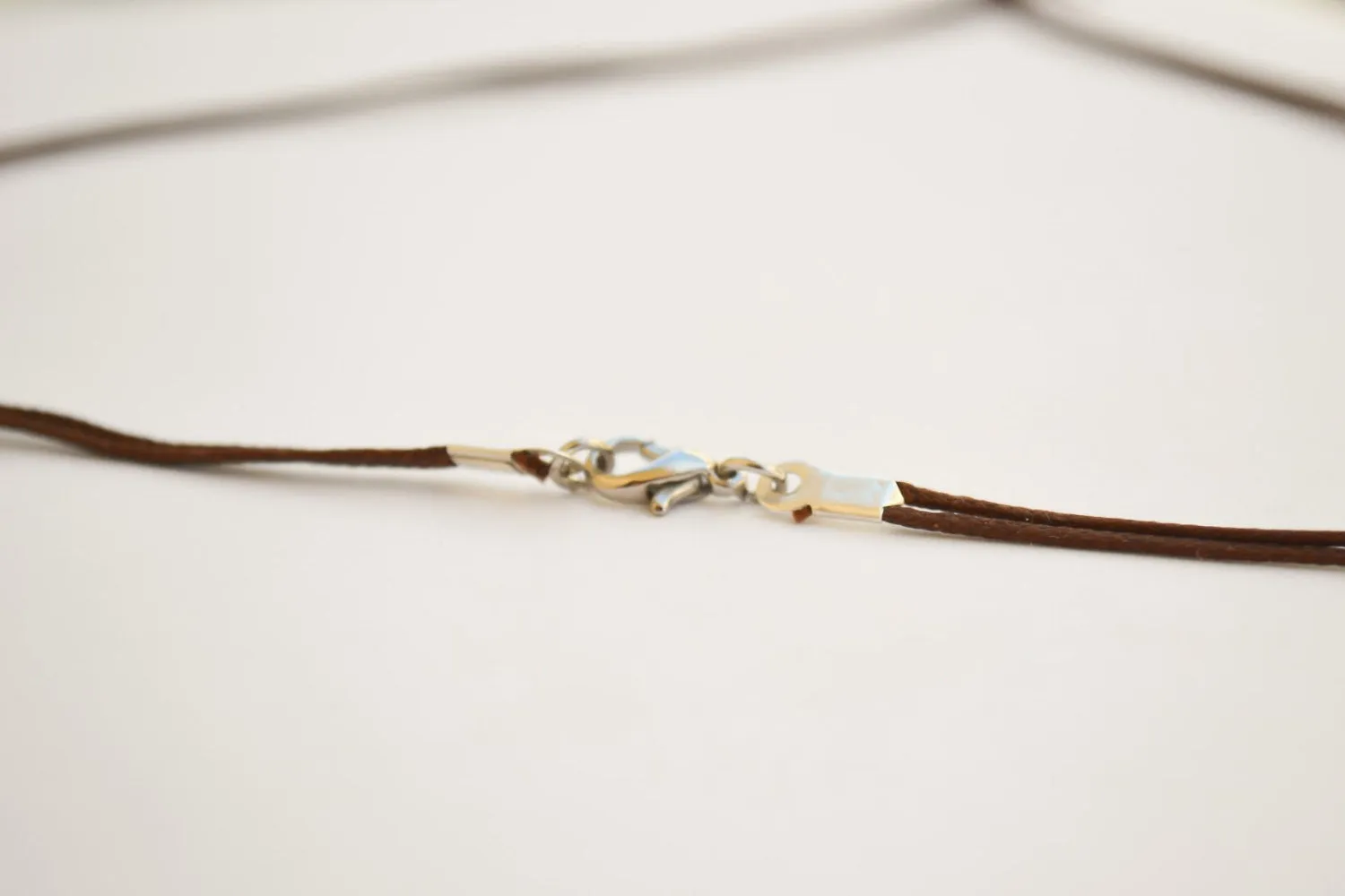 Silver Hamsa necklace for men, brown cord, Jewish jewelry